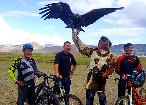 Cycling with golden eagle in Mongolia